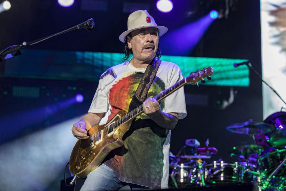 CHULA VISTA, CALIFORNIA - JUNE 17: Guitarist Carlos Santana of Santana performs on stage at North Island Credit Union Amphitheatre on June 17, 2022 in Chula Vista, California. (Photo by Daniel Knighton/Getty Images)