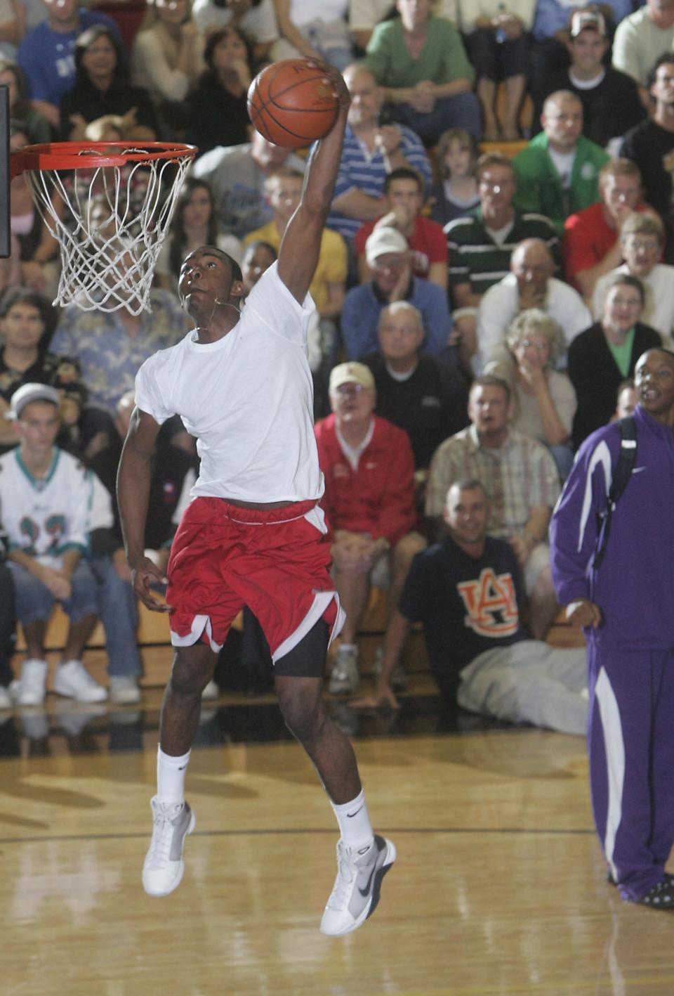 Word of God's John Wall, a future 5-time NBA All-Star, throws down the winning dunk during the slam-dunk contest at the 36th Annual City of Palms Classic at Bishop Verot High School on Dec. 22, 2008.