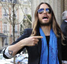 American actor Jared Leto arrives at Miu Miu's ready to wear fall/winter 2014-2015 fashion collection presented in Paris, Wednesday, March 5, 2014. (AP Photo/Zacharie Scheurer)