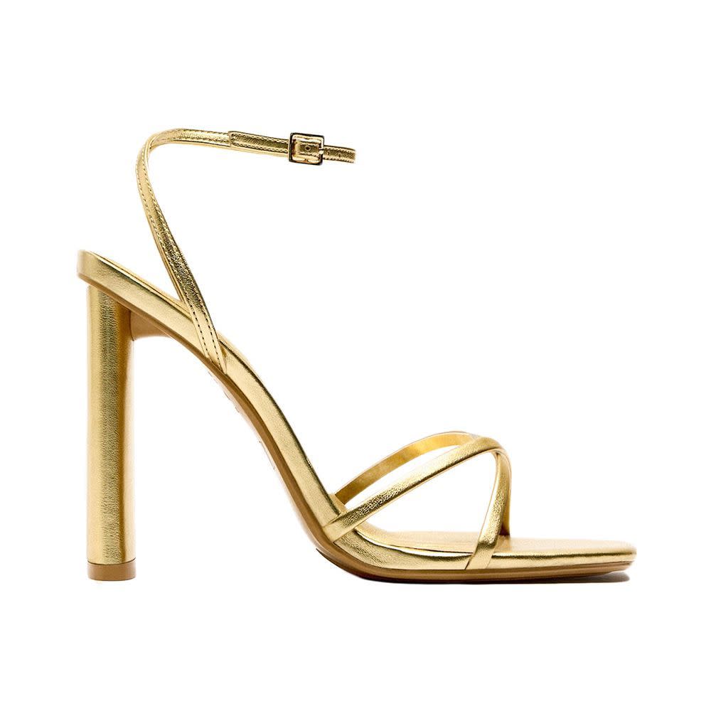 <p><a href="https://go.redirectingat.com?id=74968X1596630&url=https%3A%2F%2Fwww.zara.com%2Fus%2Fen%2Fstrappy-metallic-heeled-sandals-p13337110.html&sref=https%3A%2F%2F" rel="nofollow noopener" target="_blank" data-ylk="slk:Shop Now;elm:context_link;itc:0;sec:content-canvas" class="link rapid-noclick-resp">Shop Now</a></p><p>Strappy Metallic Heeled Sandals</p><p>zara.com</p><p>$49.90</p>