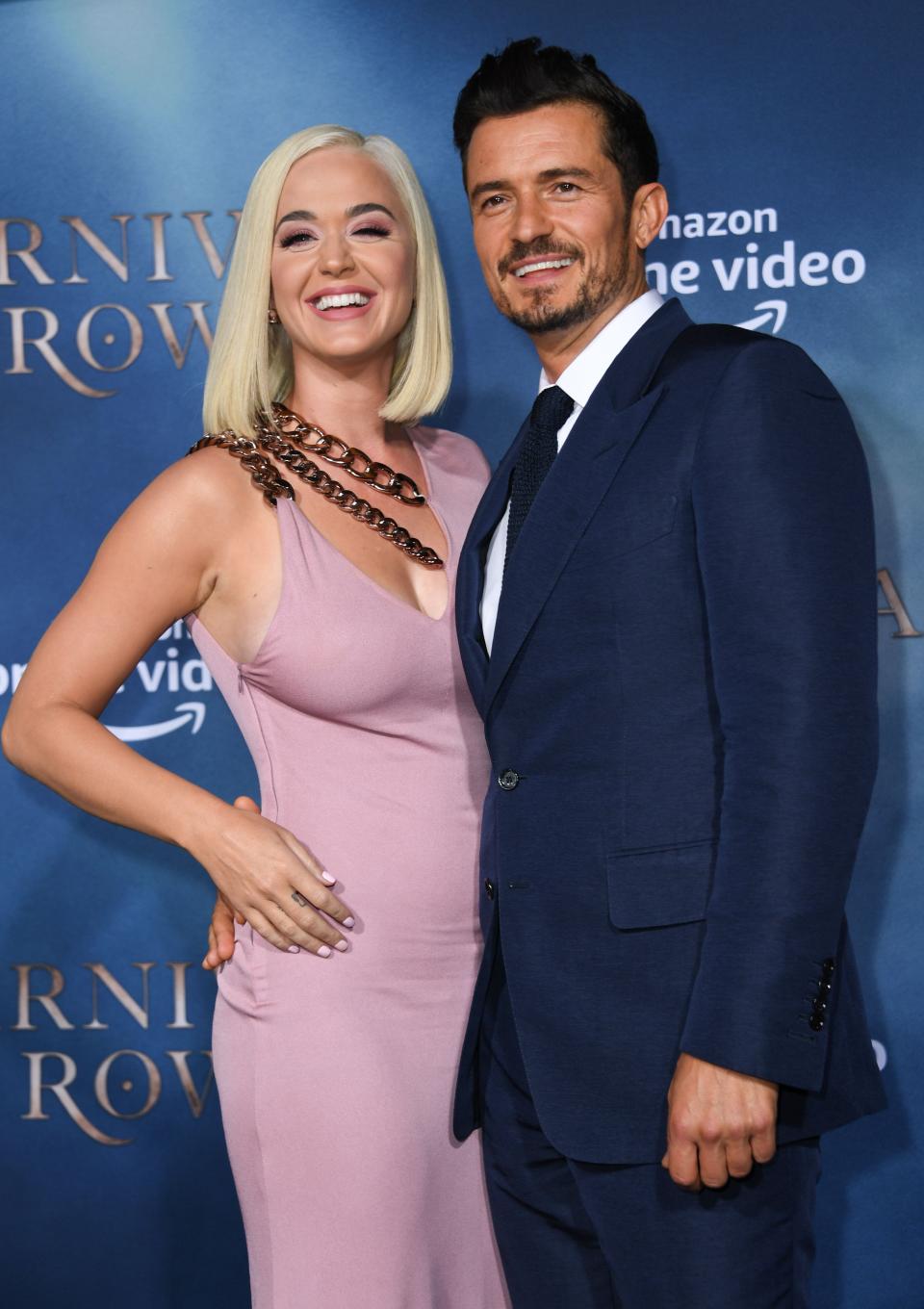Katy Perry, left, gave a glimpse into her enduring relationship with Orlando Bloom in an Instagram post Saturday. "We continuously put in the work," Perry wrote.
