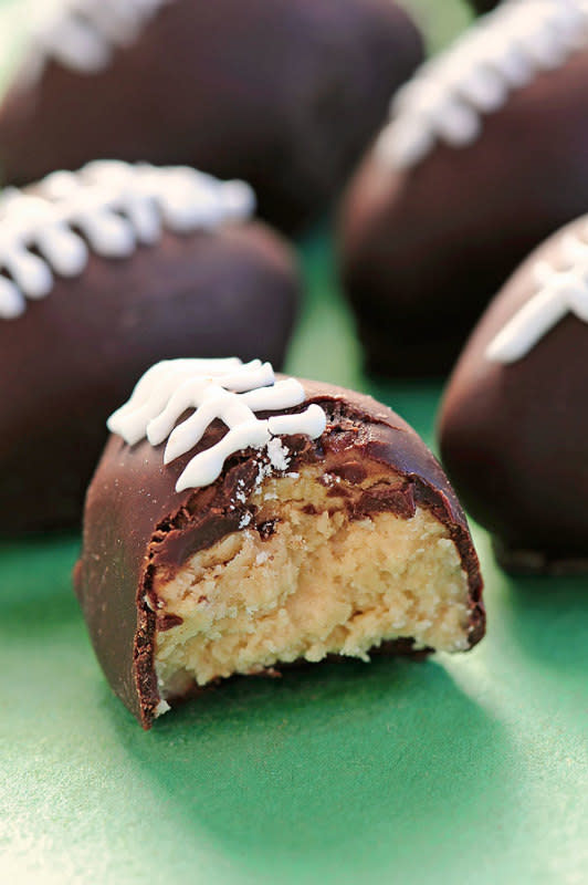 <p>She Wears Many Hats</p><p><strong>Get the recipe: </strong><a href="https://shewearsmanyhats.com/chocolate-peanut-butter-footballs/" rel="nofollow noopener" target="_blank" data-ylk="slk:Chocolate Peanut Butter Footballs;elm:context_link;itc:0;sec:content-canvas" class="link "><strong>Chocolate Peanut Butter Footballs</strong></a></p>