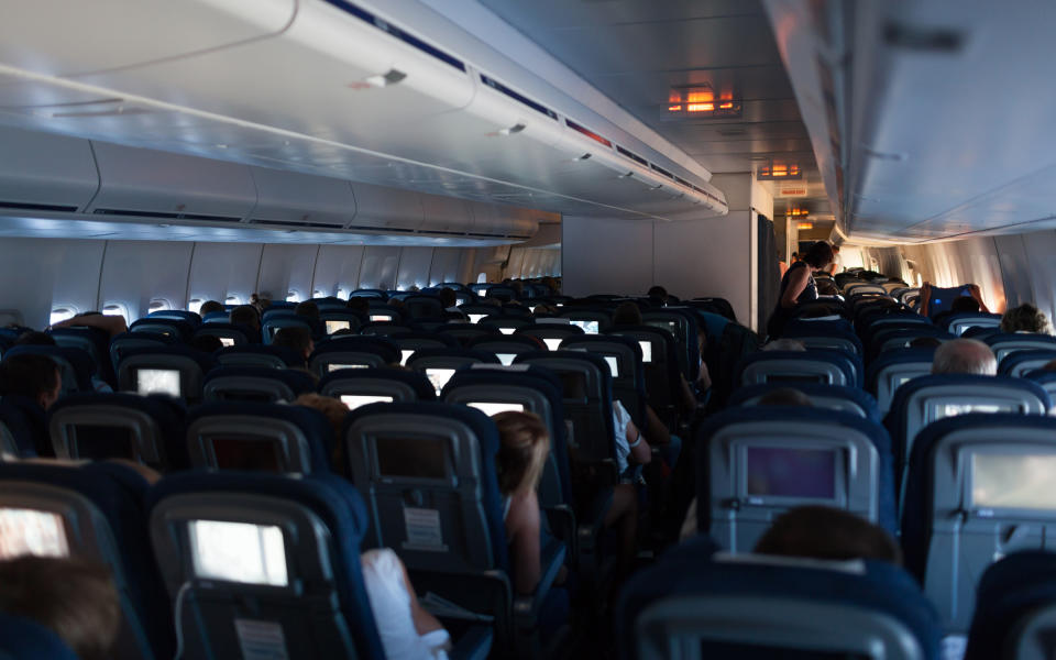 <p>When a plane lands at night, cabin crews will dim the interior lights. Why? In the unlikely event that the plane landing goes badly and passengers need to evacuate, their eyes will already be adjusted to the darkness. As pilot Chris Cooke <a rel="nofollow noopener" href="http://www.travelandleisure.com/blogs/why-do-airplanes-dim-lights-on-takeoff" target="_blank" data-ylk="slk:explained to T+L;elm:context_link;itc:0;sec:content-canvas" class="link ">explained to <em>T+L</em></a>: “Imagine being in an unfamiliar bright room filled with obstacles when someone turns off the lights and asks you to exit quickly.”</p> <p>Similarly, flight attendants have passengers raise their window shades during landing, so they can see outside in an emergency and assess if one side of the plane is better for an evacuation.</p>