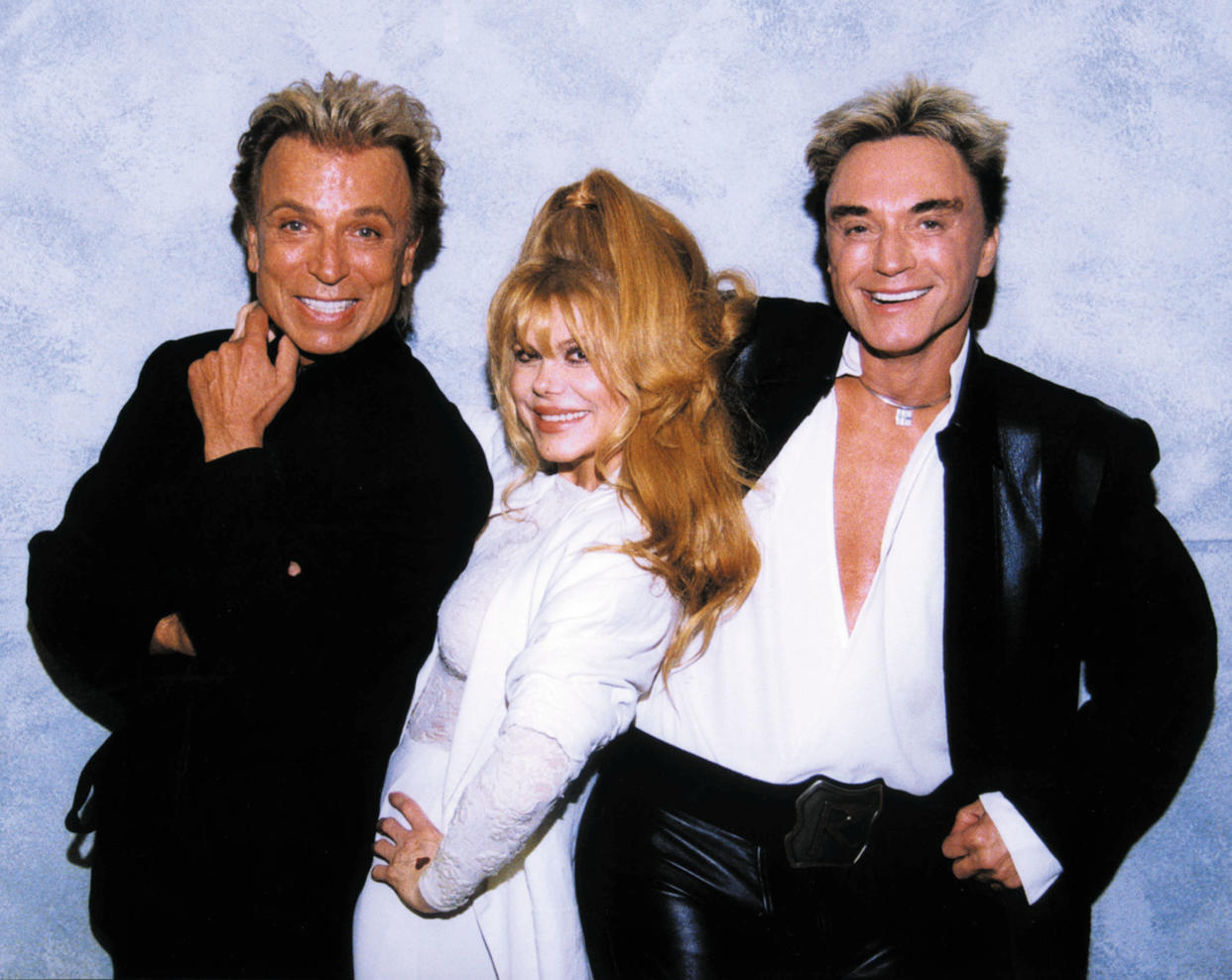 Singer Charo was also a fan of the magician duo and posed backstage at the Mirage in 2002. 