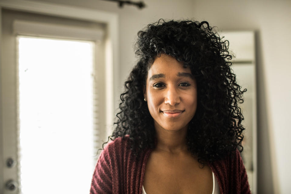 A woman smiling