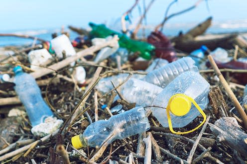 <span class="caption">The mismanagement of plastic waste is one of the main causes of plastic pollution in nature.</span> <span class="attribution"><a class="link " href="https://www.shutterstock.com/image-photo/spilled-garbage-on-beach-big-city-1060330253" rel="nofollow noopener" target="_blank" data-ylk="slk:Larina Marina/Shutterstock;elm:context_link;itc:0;sec:content-canvas">Larina Marina/Shutterstock</a></span>