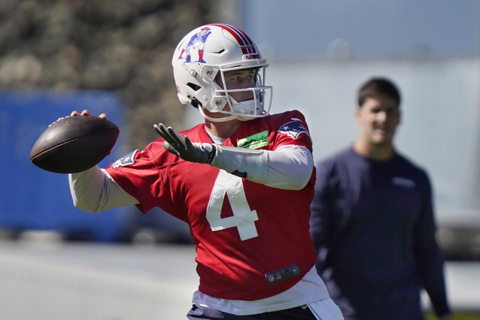 New England Patriots quarterback Bailey Zappe winds up to pass during an NFL football practice, Thursday, Oct. 6, 2022, in Foxborough, Mass. (AP Photo/Steven Senne)