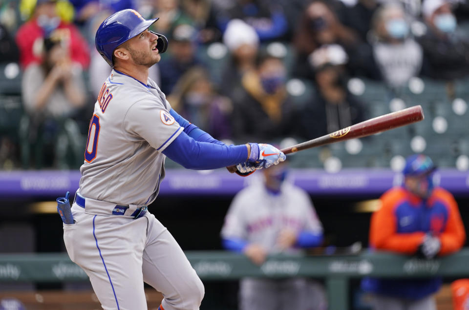 New York Mets' Pete Alonso flies out against Colorado Rockies relief pitcher Mychal Givens in the eighth inning of a baseball game Sunday, April 18, 2021, in Denver. (AP Photo/David Zalubowski)