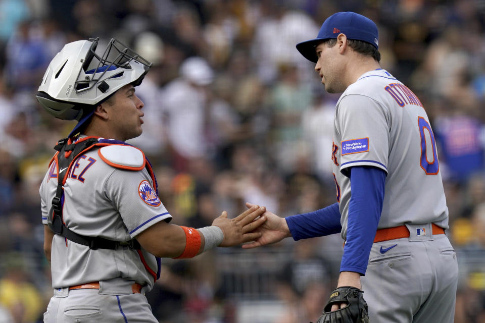 New York Mets catcher Francisco Alvarez congratulates relief pitcher Adam Ottavino afer he got the final out against the Pittsburgh Pirates in the ninth inning in a baseball game in Pittsburgh, Saturday, June 10, 2023. (AP Photo/Matt Freed)