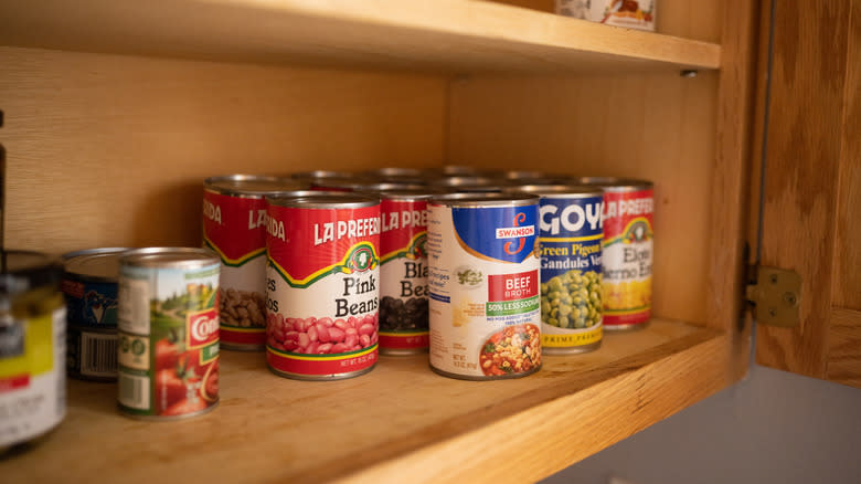 canned beans and vegetables in pantry