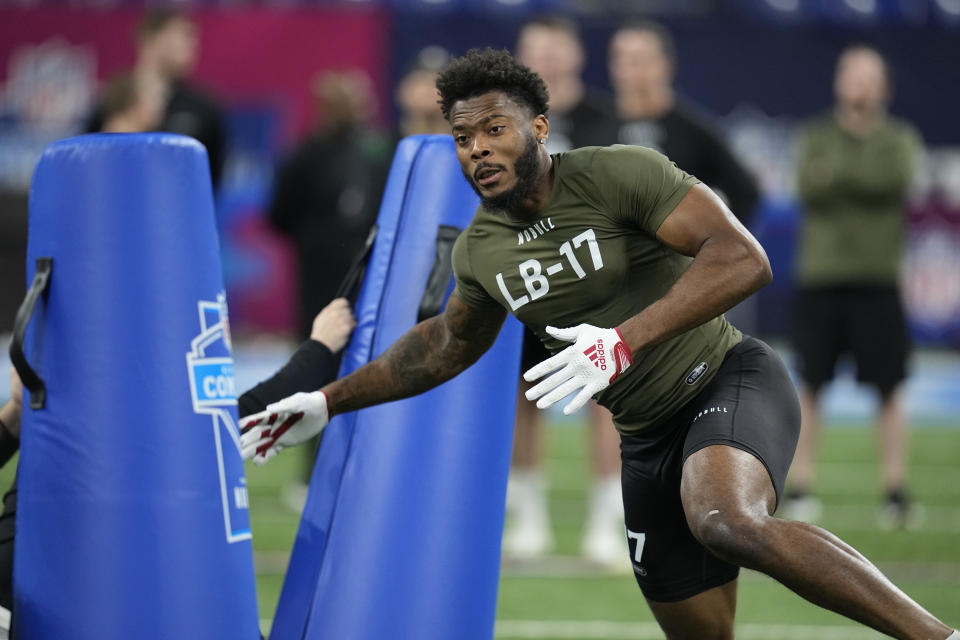 Nebraska linebacker Ochaun Mathis runs a drill at the NFL football scouting combine in Indianapolis, Thursday, March 2, 2023. (AP Photo/Darron Cummings)