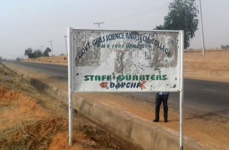 A sign for the Government Girls Science and Technical College is pictured in Dapchi, in the northeastern state of Yobe, Nigeria February 22, 2018. REUTERS/Ola Lanre/Files