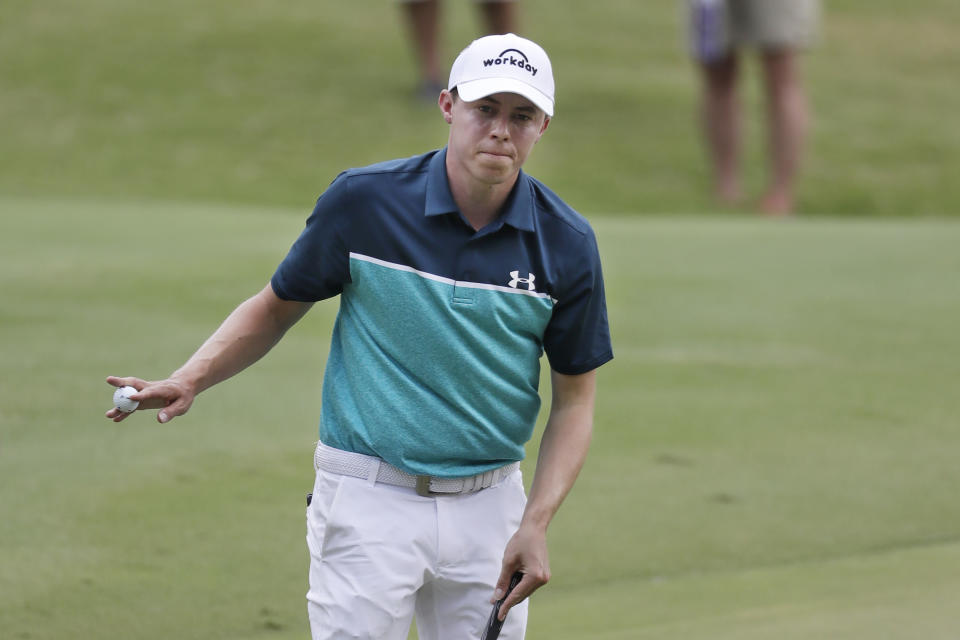 Matthew Fitzpatrick, of England, acknowledges the crowd after sinking his putt on the fourth hole during the third round of the World Golf Championships-FedEx St. Jude Invitational Saturday, July 27, 2019, in Memphis, Tenn. (AP Photo/Mark Humphrey)