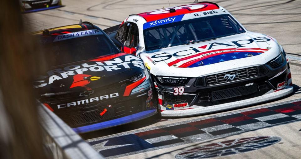 Sam Mayer and Ryan Sieg bang doors in a photo finish in the NASCAR Xfinity Series race at Texas Motor Speedway.