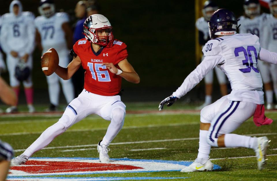 Cole Feuerbacher, of Glendale, looks to pass the ball during the Falcons game against Camdenton at Glendale High School on Friday, Oct. 15, 2021.