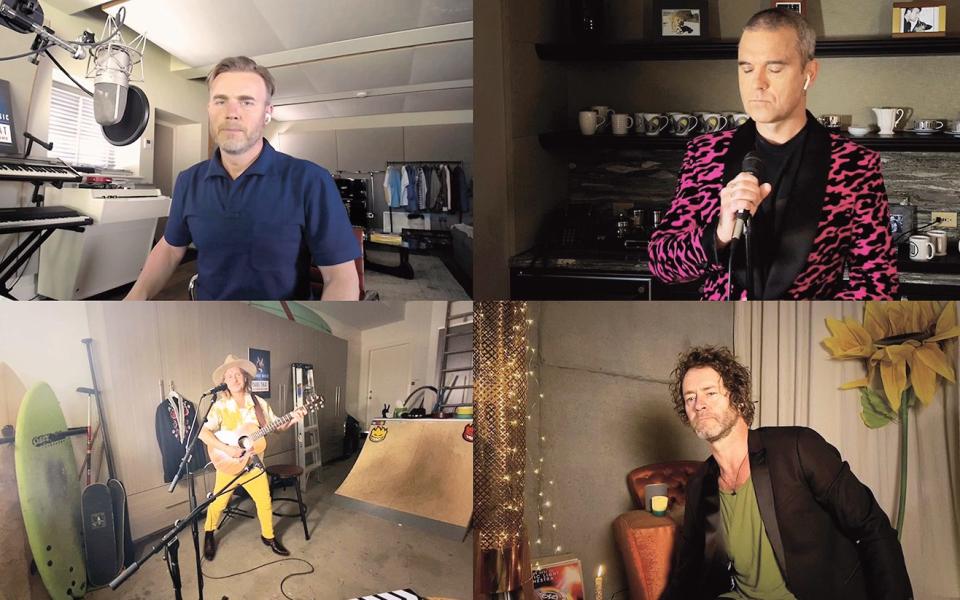 With Robbie Williams, Howard Donald and Mark Owen, performing during lockdown - Getty Images 