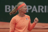 Netherlands' Kiki Bertens celebrates winning her first round match of the French Open tennis tournament against Ukraine's Katarina Zavatska at the Roland Garros stadium in Paris, France, Monday, Sept. 28, 2020. (AP Photo/Michel Euler)