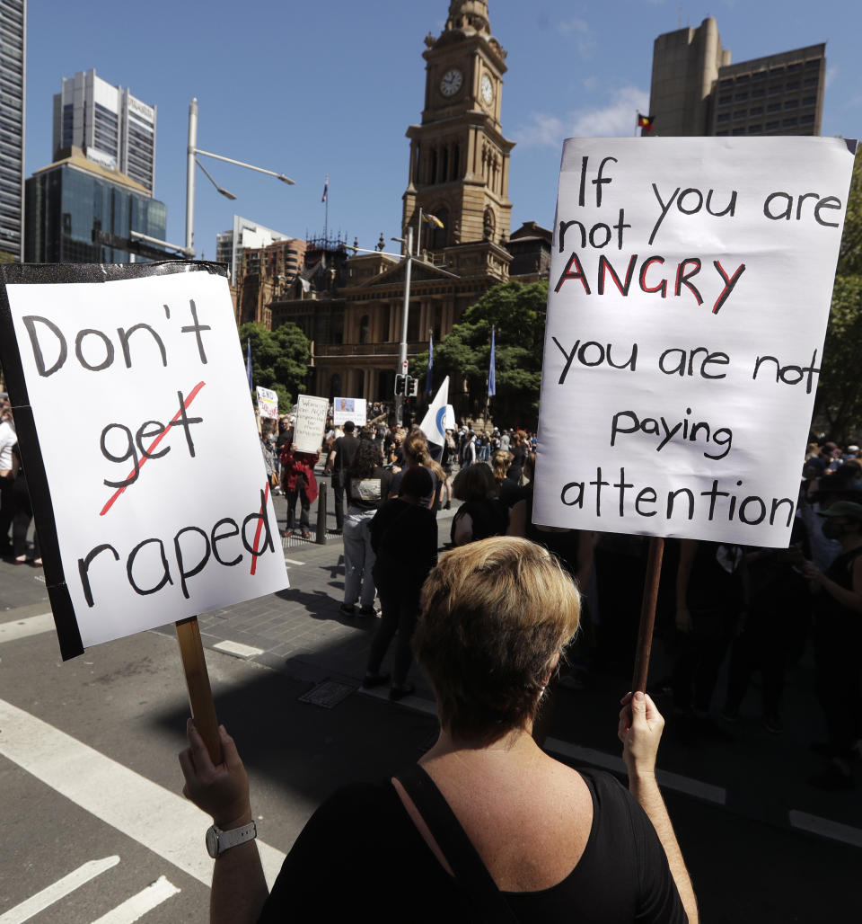 Thousands of people with placards and banners rally demanding justice for women in Sydney, Monday, March 15, 2021, as the government reels from two separate allegations. The rally was one of several across Australia including in Canberra, Melbourne, Brisbane and Hobart calling out sexism, misogyny and dangerous workplace cultures. (AP Photo/Rick Rycroft)