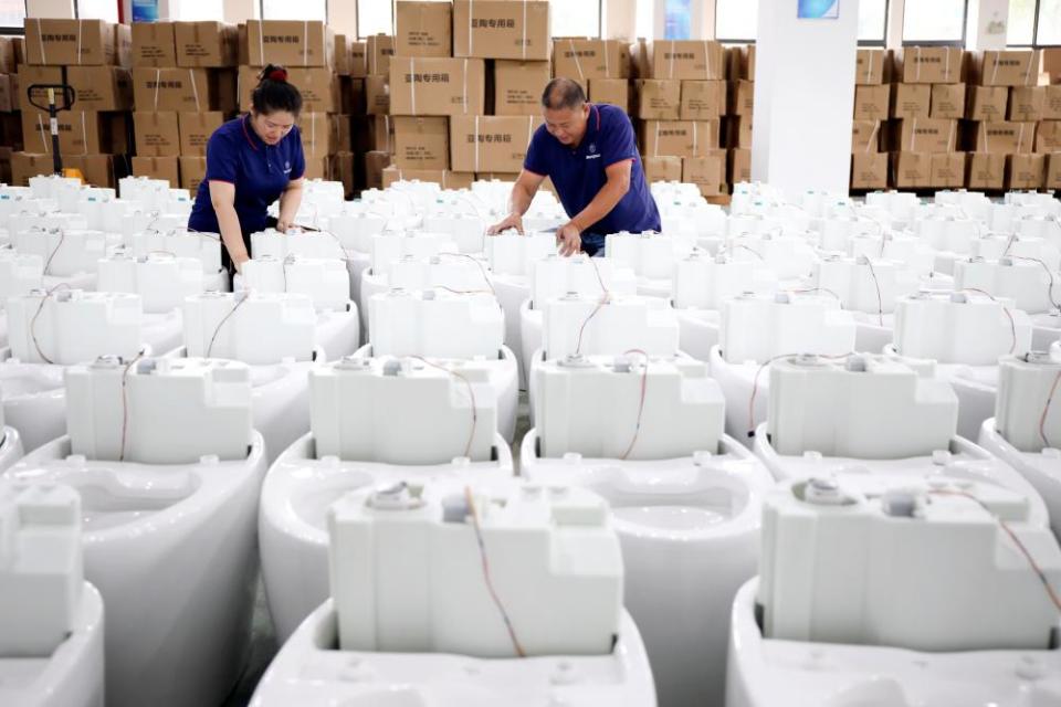 Smart toilets being assembled at a factory in Tonglu county, China