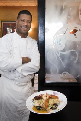 Chef Joe Brown is shown at the former Melange Cafe in Cherry Hill. His popular restaurant was located on Chapel Avenue. Brown has written a book/cookbook called 'Melange. The Story, The Recipes, The Faith.'