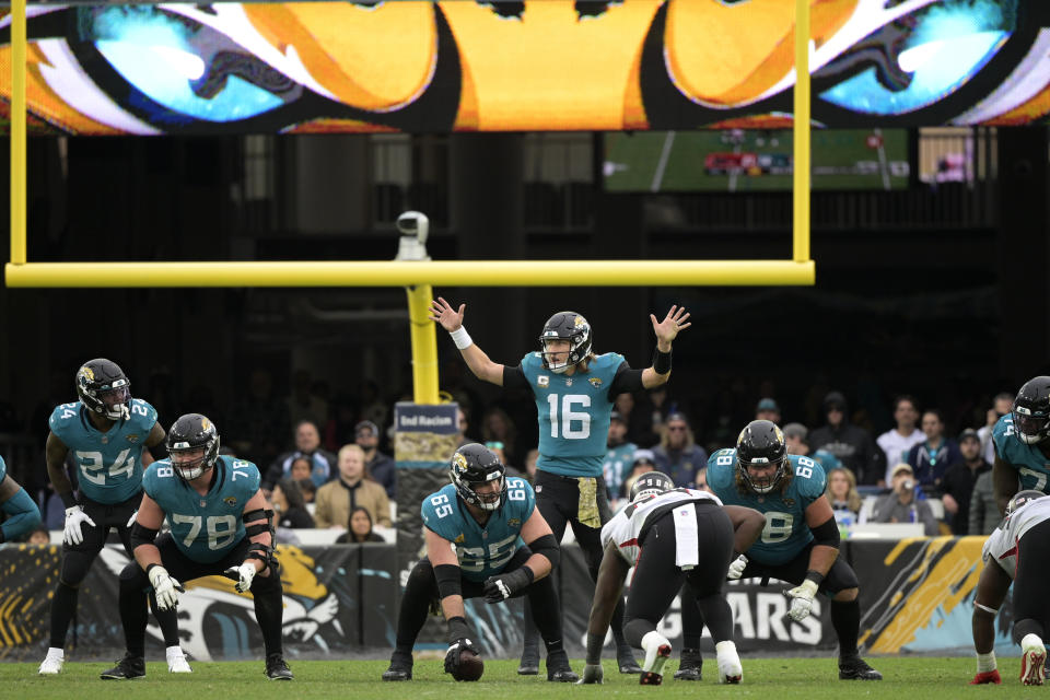 Jacksonville Jaguars quarterback Trevor Lawrence (16) call signals against the Atlanta Falcons during the second half of an NFL football game, Sunday, Nov. 28, 2021, in Jacksonville, Fla. (AP Photo/Phelan M. Ebenhack)