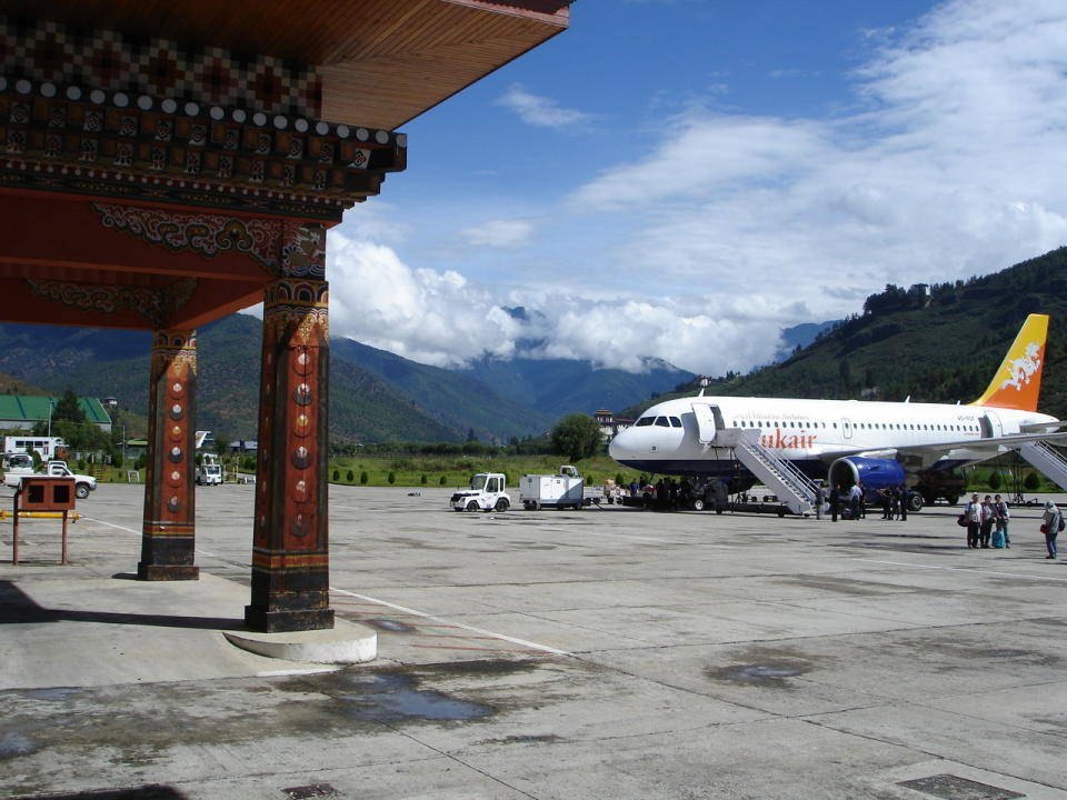 The only international airport in Bhutan, the airport sits nestled <a href="http://www.businessinsider.com/bhutans-paro-airport-is-among-worlds-most-dangerous-2013-3" target="_blank">amongst 18,000 foot mountains</a>. It's such a challenging approach and take off that <a href="http://www.huffingtonpost.com/travel-leisure/worlds-scariest-runways-video_b_1910927.html" target="_blank">only 8 pilots are certified to fly into it</a>. 