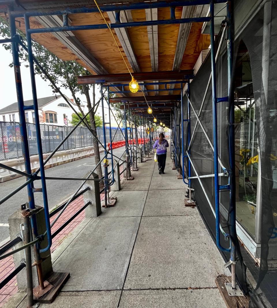 The sidewalk extending from 1 Main St. to 31 Main St. is once again open to pedestrians.