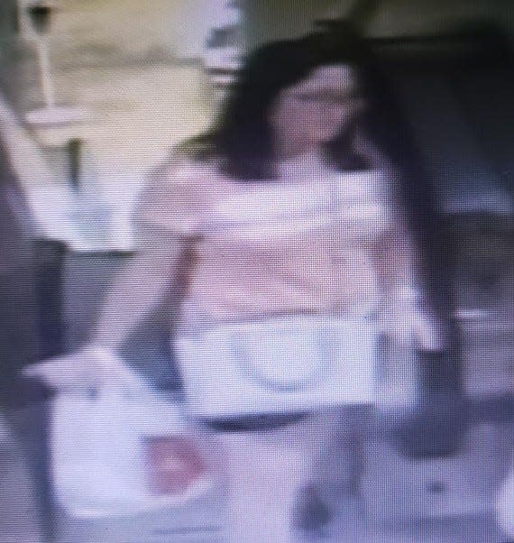 A woman caught on video is wanted in connection with a case at Dillard's in Central Mall where swimwear was defecated and urinated on.