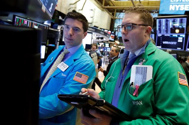NEW YORK — Stock markets around the world are down Monday after China reported a drop in exports in December. (The Associated Press)