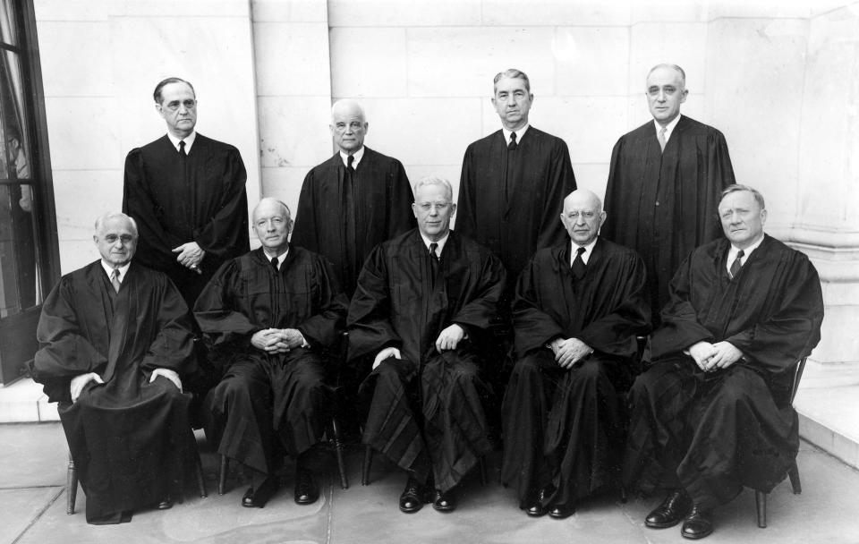 Members of the Supreme Court of the United States pose in their robes, on May 23, 1955, in Washington. Standing in the back row are, from left: Sherman Minton, Harold H. Burton, Tom Clark and John M. Harlan. Seated from left are Felix Frankfurter, Hugo Black, Chief Justice Earl Warren, Stanley Reed, and William O. Douglas. Supreme Court justices have long prized confidentiality. It’s one of the reasons the leak of a draft opinion in a major abortion case last week was so shocking. But it’s not just the justices’ work on opinions that they understandably like to keep under wraps. The justices are also ultimately the gatekeepers to information about their travel, speaking engagements and health issues. (AP Photo, File)