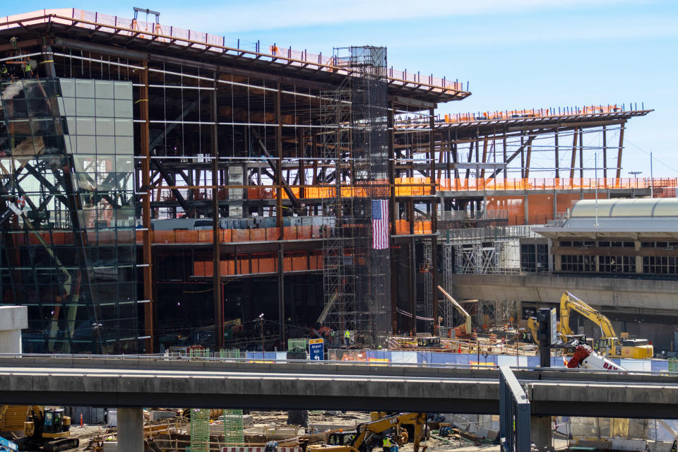 DBM Global Inc. celebrates a monumental milestone of its subsidiaries Banker Steel Co. LLC and NYC Constructors LLC in placing the final piece of major structural steel on top of JFK International Airport’s New Terminal One Headhouse.