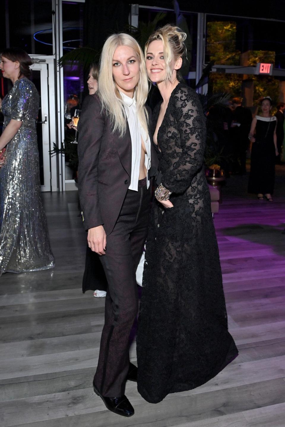 Kristen Stewart Chanel Black Plunging Lace Dress and Dylan Meyer Maroon Paisley Suit 2022 Oscars Vanity Fair After-Party