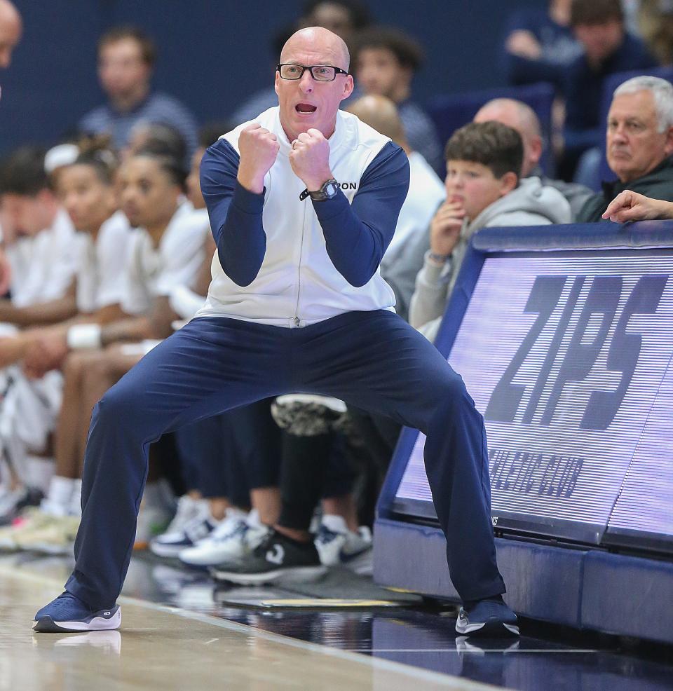 University of Akron head coach John Groce encourages his team during a win over Southern Miss on Friday, Nov. 10, 2023.