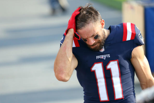 New England Patriots Julian Edelman runs after catching a pass from News  Photo - Getty Images