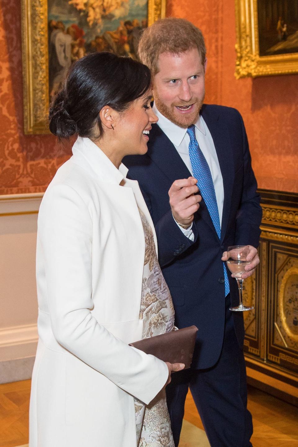 Harry and Meghan laugh