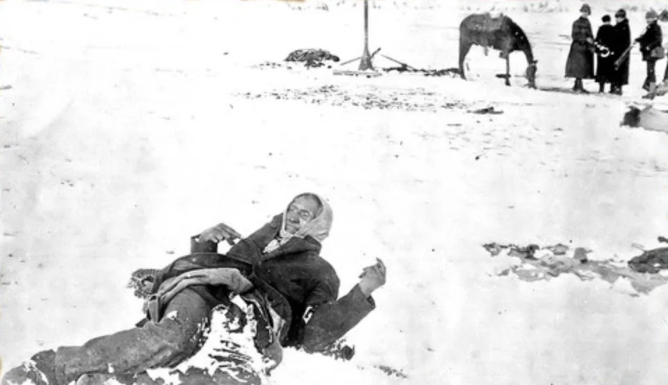 An iconic photo of Big Foot left frozen from the 1890 massacre at Wounded Knee of a dead and frozen Big Foot. (Photo/Public Domain)
