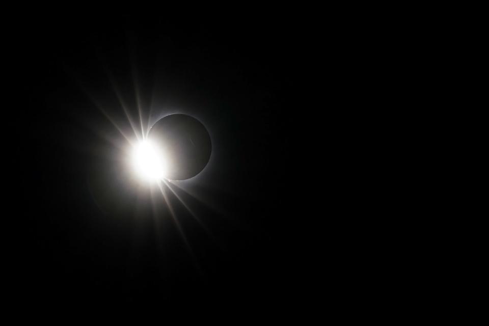 At about 99 percent of the sun blocked by the moon in the solar eclipse, Monday, April 8, 2024, pictured from Washington Park in Cincinnati.