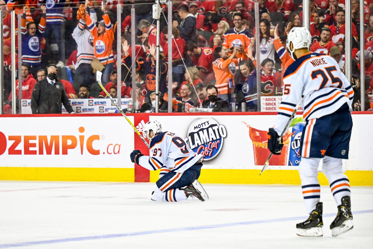 Connor McDavid (97) celebrates his series winning goal against the Calgary Flames during Game 5 of the NHL Stanley Cup playoffs. (Photo by Brett Holmes/Icon Sportswire via Getty Images)