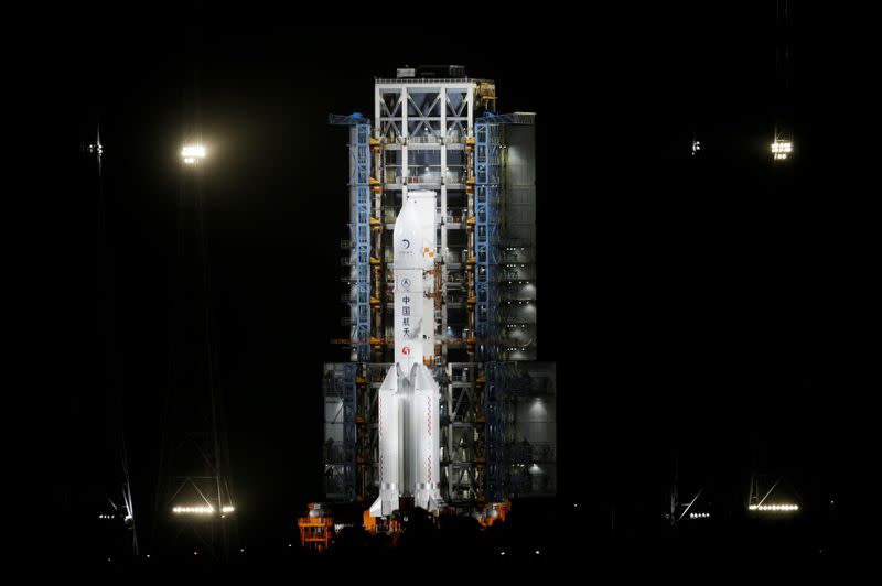 FILE PHOTO: The Long March-5 Y5 rocket, carrying the Chang'e-5 lunar probe, is seen before taking off from Wenchang Space Launch Center, in Wenchang