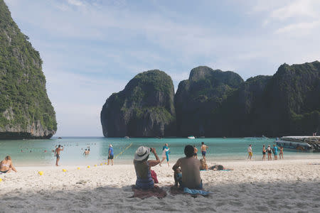 Tourists pass their time as they visit Maya bay at Krabi province, Thailand May 23, 2018. REUTERS/Soe Zeya Tun