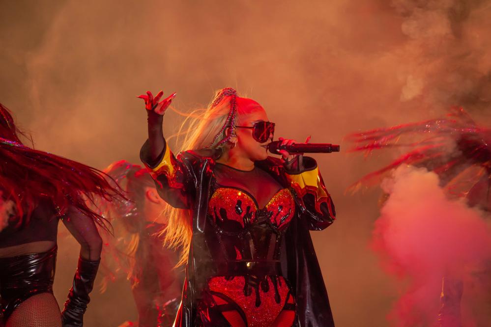 Christina Aguilera Pops in Neon Green Costume at Brighton Pride – Footwear  News