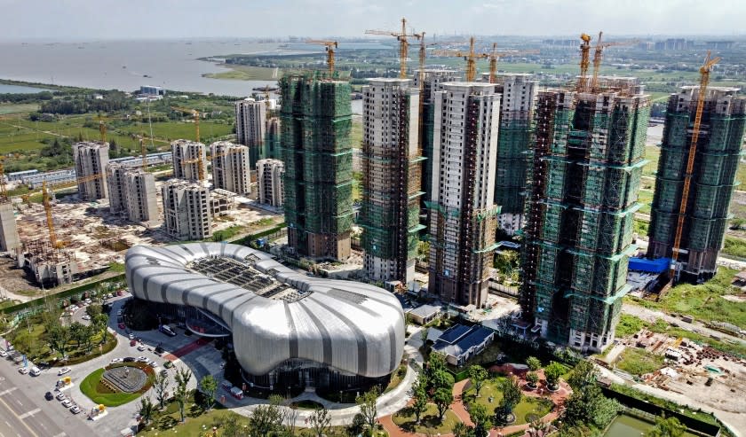 This aerial photo taken on September 17, 2021 shows the halted under-construction Evergrande Cultural Tourism City, a mixed-used residential-retail-entertainment development, in Taicang, Suzhou city, in China's eastern Jiangsu province. (Photo by Vivian LIN / AFP) (Photo by VIVIAN LIN/AFP via Getty Images)