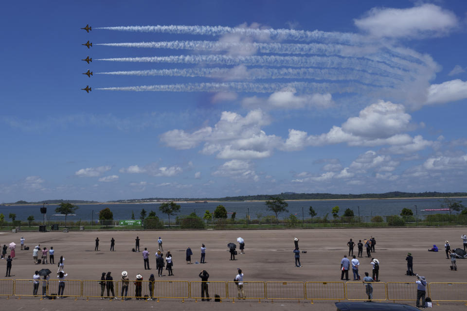 South Korean Air Force's Black Eagles aerobatic team performs during the first day of the Singapore Airshow in Singapore, Tuesday, Feb. 20, 2024. (AP Photo/Vincent Thian)