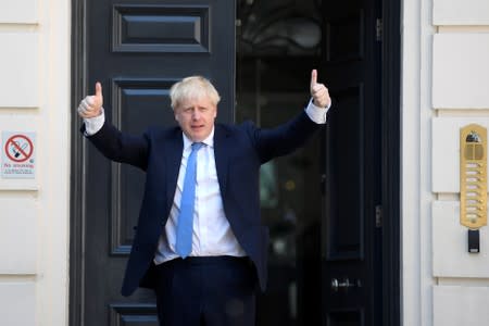 Boris Johnson arrives at the Conservative Party headquarters in London