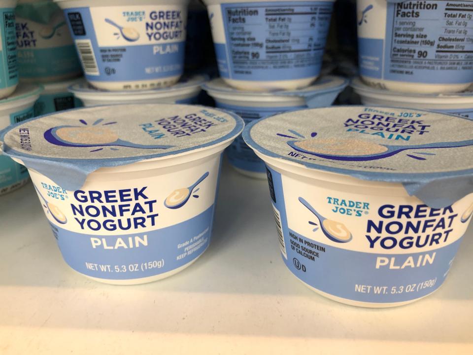 Containers of Trader Joe's plain Greek nonfat yogurt.