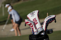 Solheim Cup team US golfers, background, practice during a training session at Finca Cortesin, near Estepona, southern Spain, on Wednesday, Sept. 20, 2023. (AP Photo/Bernat Armangue)