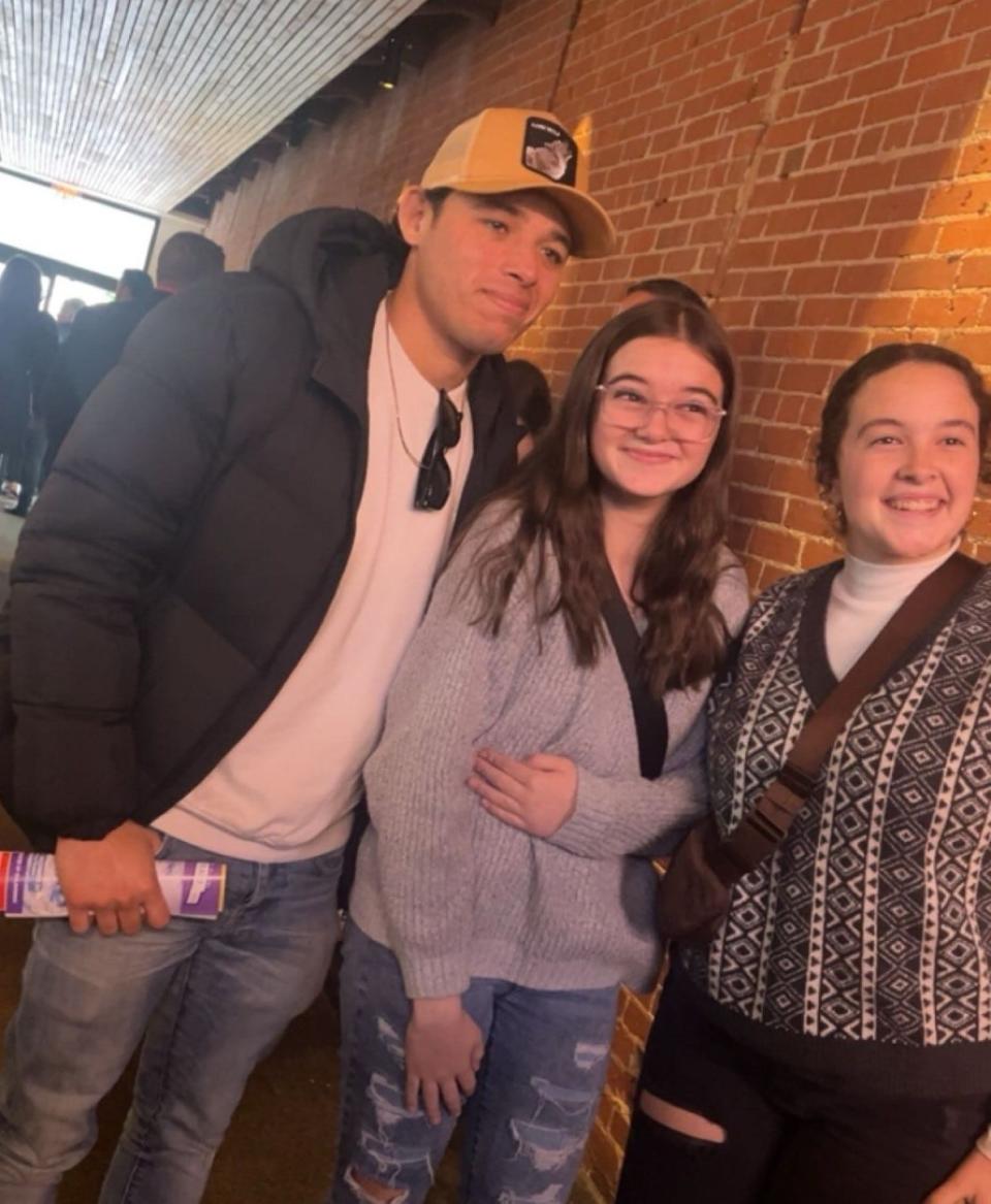 From left, actor Anthony Ramos, Adrienne Irwin and Lizzie Irwin pose for a photo after the Dec. 10 matinee of Lyric Theatre's "A Christmas Carol" in Oklahoma City's Plaza Theatre.