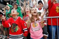 Jun 18, 2015; Chicago, IL, USA; Chicago Blackhawks fans cheer during the 2015 Stanley Cup championship parade and rally at Soldier Field. Mandatory Credit: Jon Durr-USA TODAY Sports