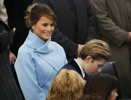 First lady Melania Trump looks at her son Barron after her husband Donald J Trump was sworn-in as the 45th President of the United States. REUTERS/Rick Wilking