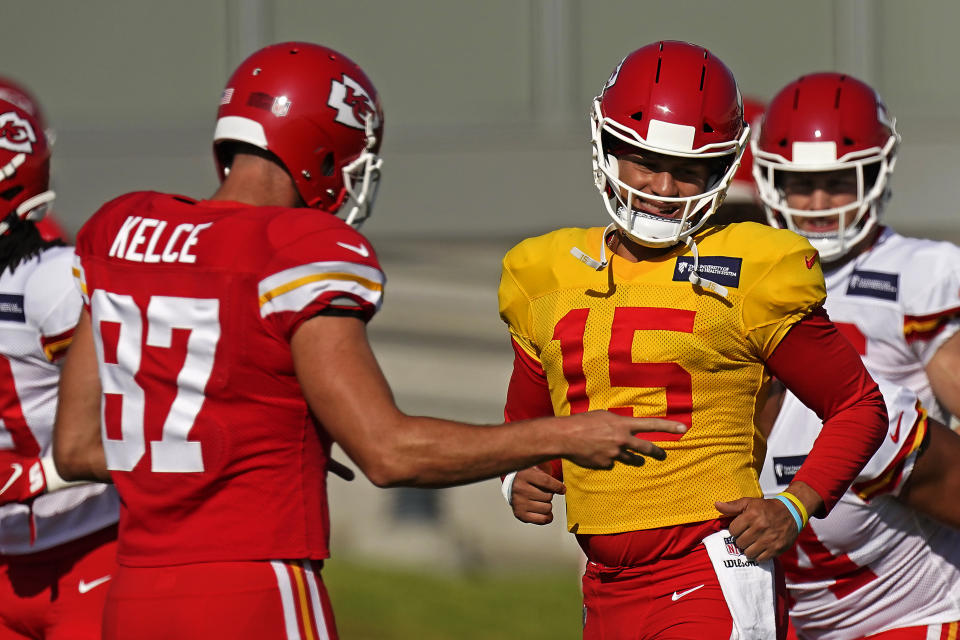 Kansas City Chiefs quarterback Patrick Mahomes (15) and tight end Travis Kelce (87) are trying to win a second straight Super Bowl. (AP Photo/Charlie Riedel)